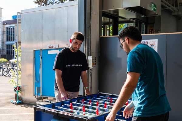 Intense work, punctuated by fun moments playing table football.