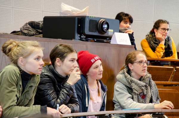 Taster week participants in an auditorium