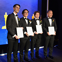 Bernd Bickel, Thabo Beeler, Derek Bradley and Markus Gross (from left) are presenting their award certificate to the press. 