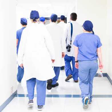 Photo of medical staff walking down a corridor