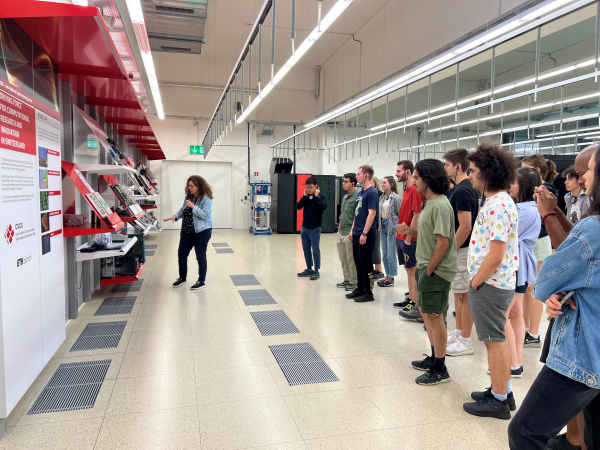 A women explains to the students how the supercomputer at the Swiss National Supercomputing Centre (CSCS) in Lugano works