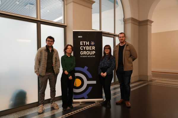 Group photo with four members.